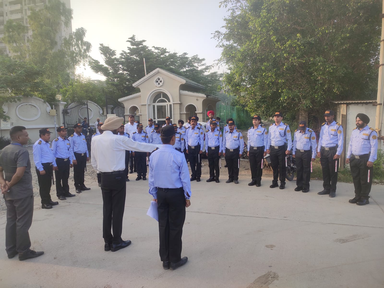 Security personnel managing a main gate